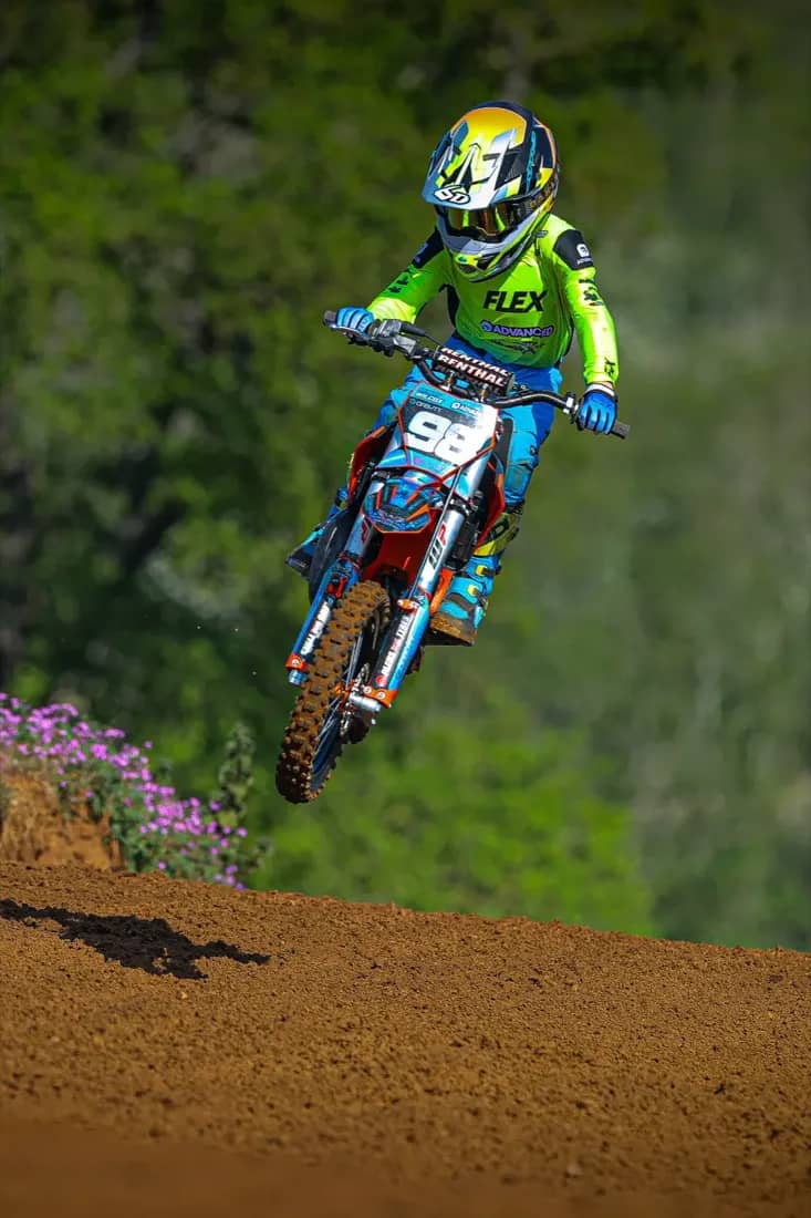 Henry Wilcox airborne over a jump