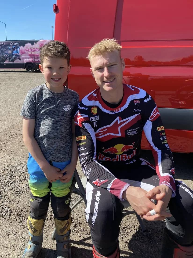Henry Wilcox meeting a pro rider in the paddock