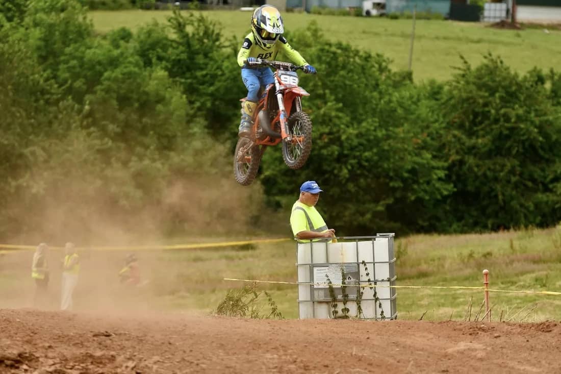 Henry Wilcox flying his #98 KTM over a jump